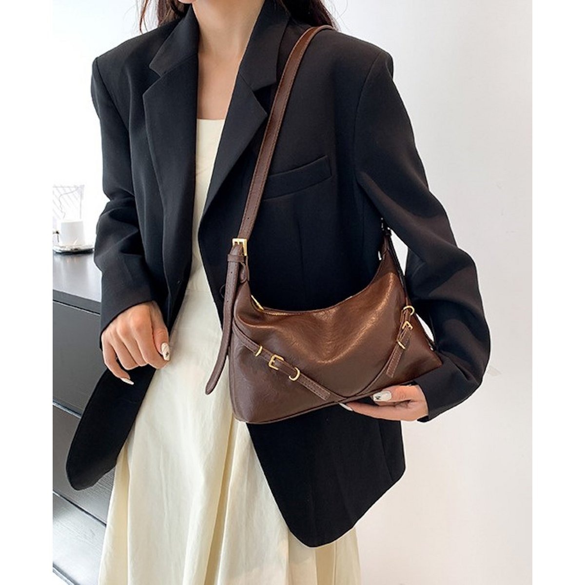 AnBeck ‘The Charm’ – Kleine schoudertas/crossbodytas van zacht leer